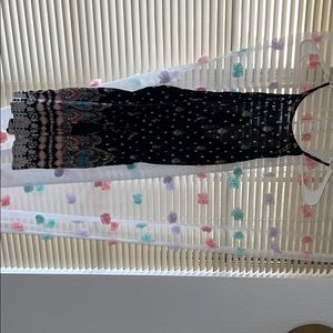 Black romper with some designs